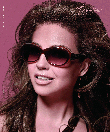 Image is property of Kenmark Optical. Visit kenmarkoptical.com Thalia con lentes gafas glasses